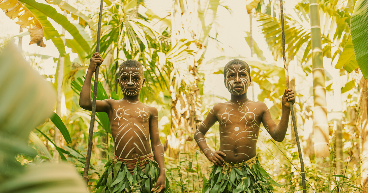 Young Siddi dancers pose for a portrait in Karnataka, India. Photo by Asha Stuart