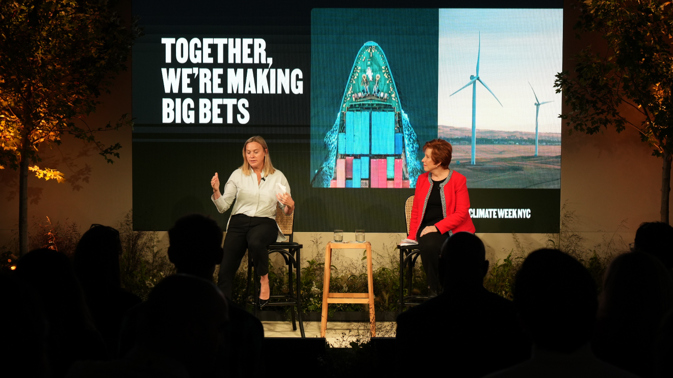Lee Kindberg and Melissa Peterson on stage at The Climate Pledge Summit.